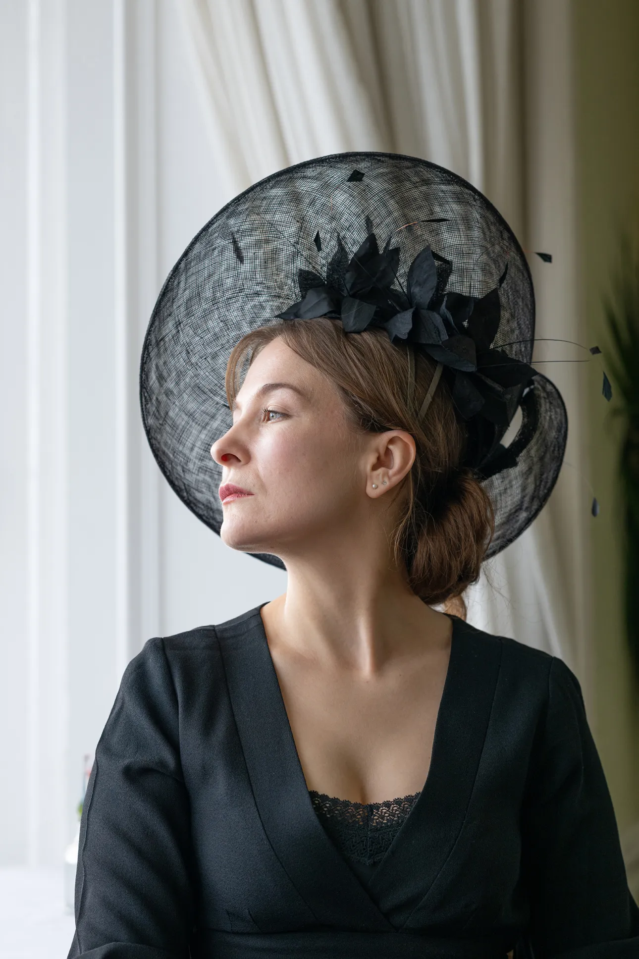 Black Sculpted Hat with Orchid Flowers